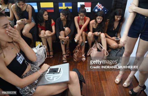 Models wait for the Lakmé Fashion Week Winter/Festive 2018 edition model auditions in Mumbai on June 28, 2018. - Lakmé Fashion Week, Indias most...