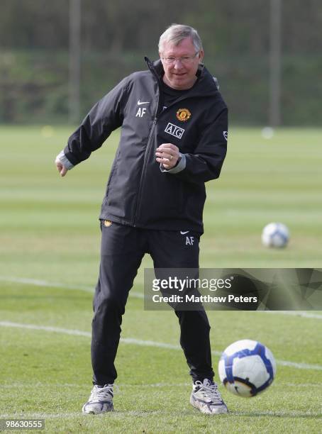 Manager Sir Alex Ferguson of Manchester United in action on the ball during a First Team Training Session at Carrington Training Ground on April 23...