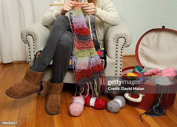 landscape shot of woman knitting - knitting stock pictures, royalty-free photos & images