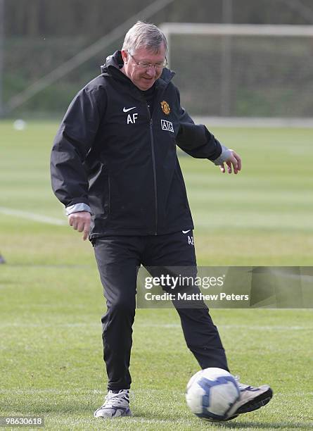 Manager Sir Alex Ferguson of Manchester United in action on the ball during a First Team Training Session at Carrington Training Ground on April 23...