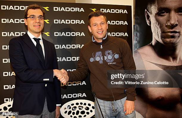 Diadora President Enrico Moretti Polegato and UC Sampdoria forward Antonio Cassano attend the Diadora Press Conference held at Diadora Store on April...