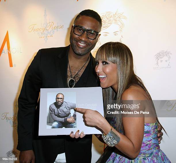 Kieth Cambell and Adrienne Bailon attends the "Cuts Of Our Infirmities" book launch party at the Tracy Reese Boutique on April 22, 2010 in New York...