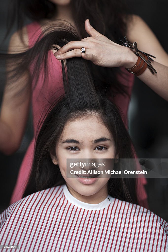 Teenage Girl Getting Hair Cut At Salon High-Res Stock Photo - Getty Images