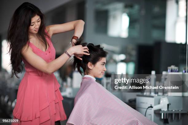 teenage girl getting hair done in salon - perfect girls body stock pictures, royalty-free photos & images