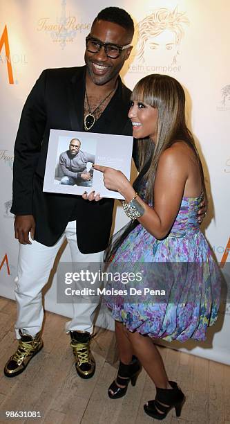 Kieth Cambell and Adrienne Bailon attends the "Cuts Of Our Infirmities" book launch party at the Tracy Reese Boutique on April 22, 2010 in New York...