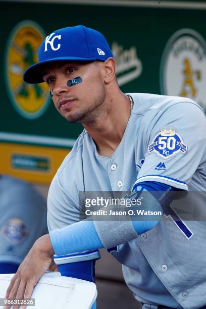 Ryan Goins of the Kansas City Royals stands in the dugout before the game against the Oakland Athletics at the Oakland Coliseum on June 8, 2018 in...
