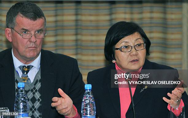 Kyrgyz interim leader Roza Otunbayeva talks during a meeting with the chief of the International Busyness Counsil Hyu Mackinon in Bishkek on April...