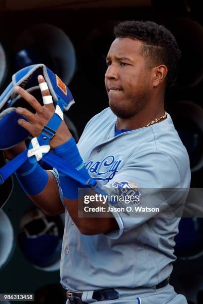 Salvador Perez of the Kansas City Royals stands in the dugout before the game against the Oakland Athletics at the Oakland Coliseum on June 8, 2018...