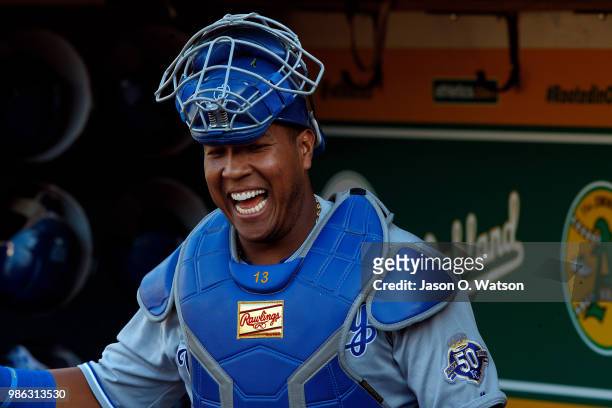 Salvador Perez of the Kansas City Royals stands in the dugout before the game against the Oakland Athletics at the Oakland Coliseum on June 8, 2018...