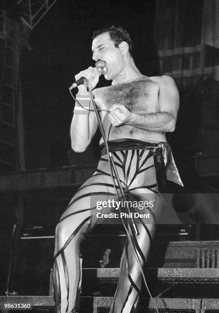 Freddie Mercury of Queen performs on stage at Wembley Arena on 4th September 1984 in London.