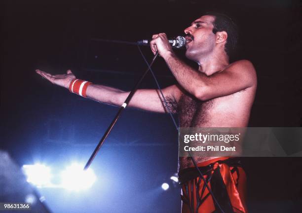 Freddie Mercury of Queen performs on stage at Wembley Arena on 4th September 1984 in London.