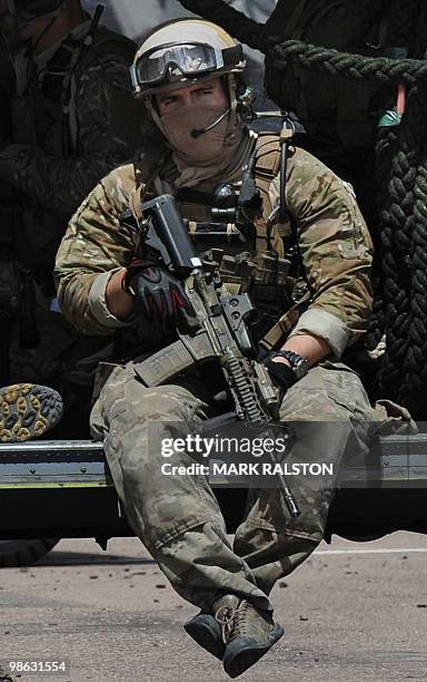 United States soldier sits in a HH-60 Pave Hawk helicopter before a rescue operation during Exercise Angel Thunder, near the town of Bisbee in...