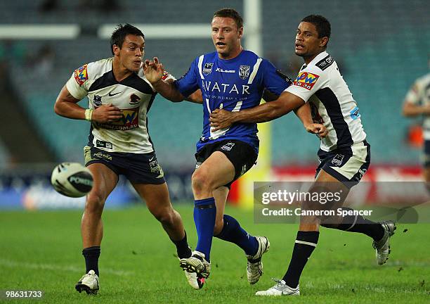 Blake Green of the Bulldogs kicks ahead during the round seven NRL match between the Canterbury Bulldogs and the Brisbane Broncos at ANZ Stadium on...