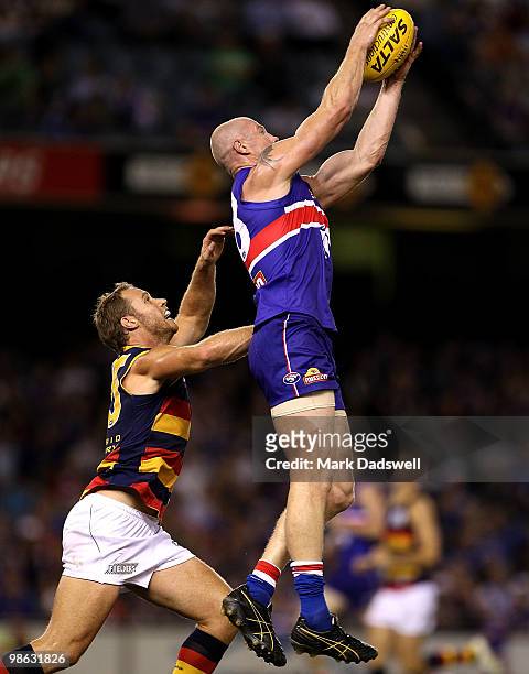 Barry Hall of the Bulldogs flies for a mark with Ben Rutten of the Crows during the round five AFL match between the Western Bulldogs and the...