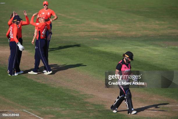 IiBRISTOL, ENGLAND England players celebrate as Katey Martin of New Zealand is bowled LBW during England Women vs New Zealand Women International T20...