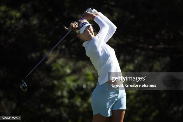 Jessica Korda watches her tee shot on the second hole during the first round of the 2018 KPMG PGA Championship at Kemper Lakes Golf Club on June 28,...