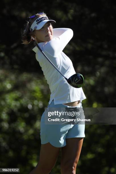 Jessica Korda watches her tee shot on the second hole during the first round of the 2018 KPMG PGA Championship at Kemper Lakes Golf Club on June 28,...