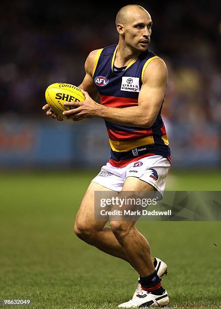 Tyson Edwards of the Crows gathers the ball during the round five AFL match between the Western Bulldogs and the Adelaide Crows at Etihad Stadium on...