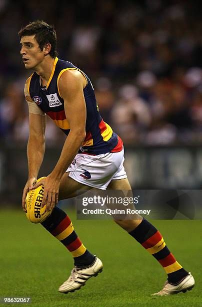 Ricky Henderson of the Crows kicks during the round five AFL match between the Western Bulldogs and the Adelaide Crows at Etihad Stadium on April 23,...