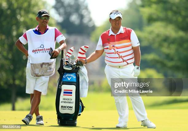 Kiradech Aphibarnrat of Thailand prepares to play a shot on the 15th fairway during the first round of the Quicken Loans National at TPC Potomac on...