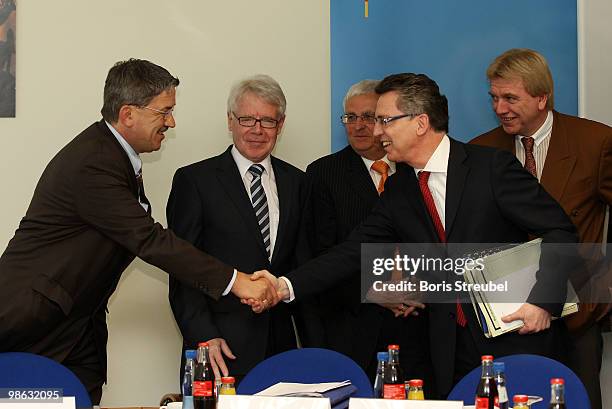 Christoph Ahlhaus, Interior Minister of the German state of Hamburg and head of the interior minister conference , Reinhard Rauball, president of the...