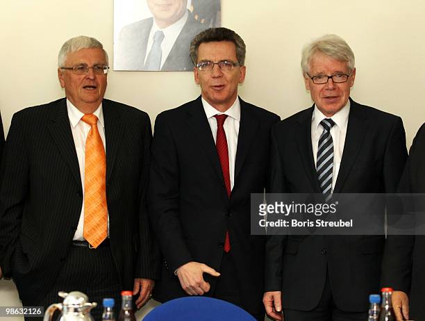 Theo Zwanziger, president of the German football association , Thomas de Maiziere, German Interior Minister and Reinhard Rauball, president of the...