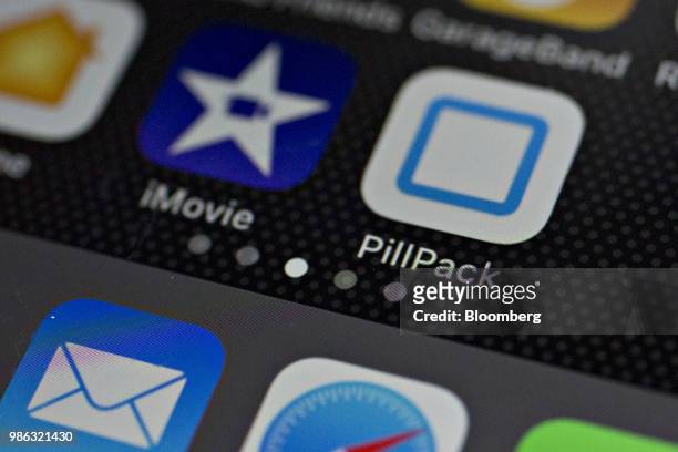 The PillPack Inc. Application icon is displayed on an Apple Inc. IPhone in an arranged photograph taken in Washington, D.C., U.S., on Thursday, June...