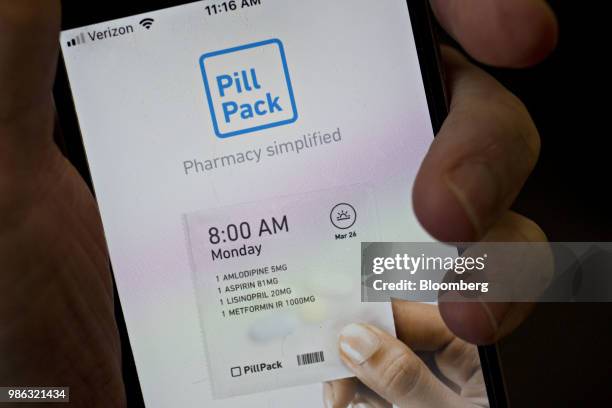 The PillPack Inc. Application is displayed on an Apple Inc. IPhone in an arranged photograph taken in Washington, D.C., U.S., on Thursday, June 28,...