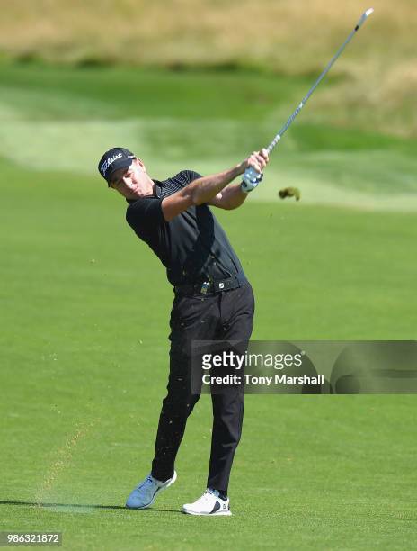 Brett Rumford of Australia plays his second shot on the 17th fairway during Day One of the HNA Open de France at Le Golf National on June 28, 2018 in...