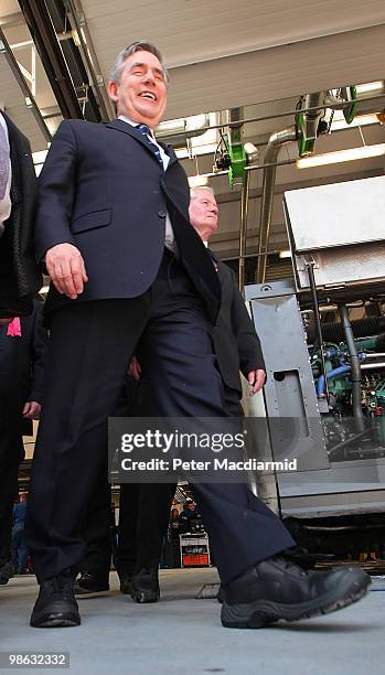 Prime Minister Gordon Brown wears protective footwear as he visits City College on April 23, 2010 in Coventry, England. The General Election, to be...