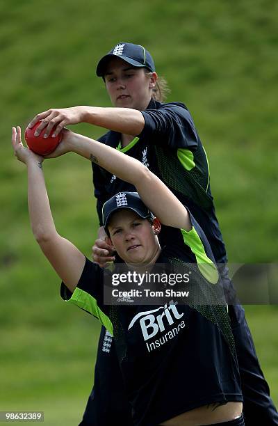 Jenny Gunn and Nicky Shaw of England warm up during the England Women's Cricket Team training session at the ECB Academy on April 23, 2010 in...