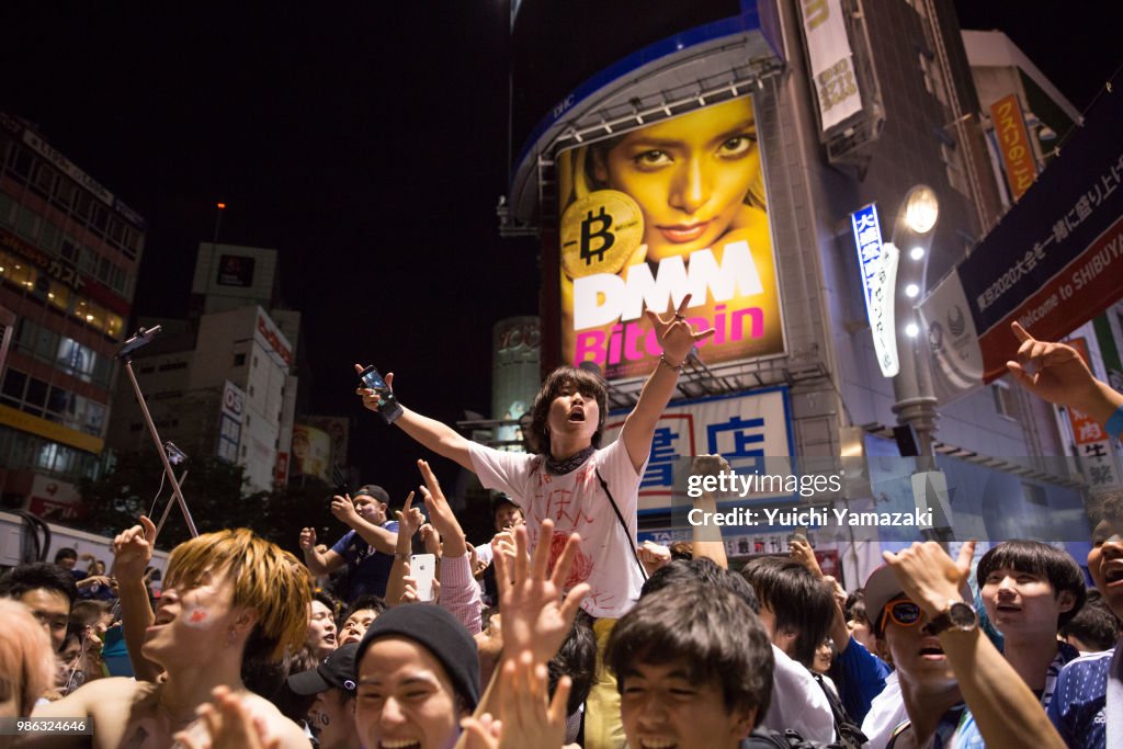 Japanese Watch FIFA World Cup Match Against Poland