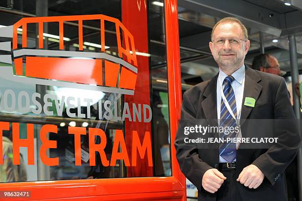 De l'Alpe d'Huez à New York: Poma, un leader mondial du transport par câble". Jean Gauthier, president of the board of the French firm POMA, stands...