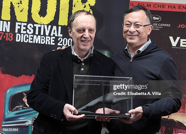 Director Johnnie To receives from Italian director Dario Argento the Black Lion awarded by the 'Courmayer Noir in Festival' at Politecnico Fandango...