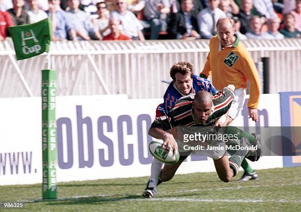 Leon Lloyd of Leicester goes over to score the winning try during the match between Stade Francais v Leicester Tigers in the Heineken Cup Final at...