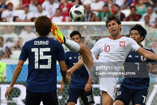 Poland's midfielder Grzegorz Krychowiak controls the ball during the Russia 2018 World Cup Group H football match between Japan and Poland at the...