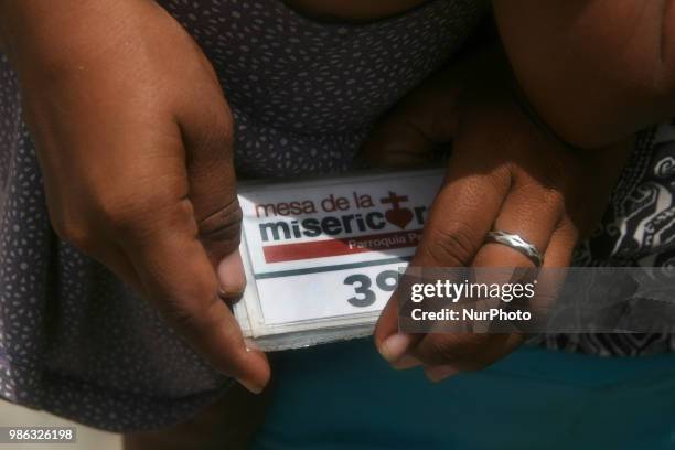 More than 1000 people, including children, adults, the elderly and the indigent, attend on June 27, 2018 in Maracaibo, Venezuela. To the Padre Claret...