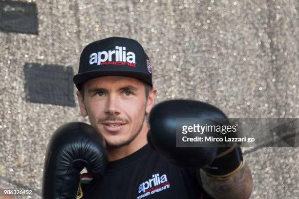 Scott Redding of Great Britain and Aprilia Racing Team Gresini plays during the pre-event "MotoGP riders will get a lesson of self-defense, with...