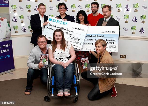 Comedians Lee Evans, Michael Mcintyre, Shappi Khorsandi, Mark Watson, Jack Dee Alan Carr and Kevin Bishop pose at a photocall for the Great Ormond...