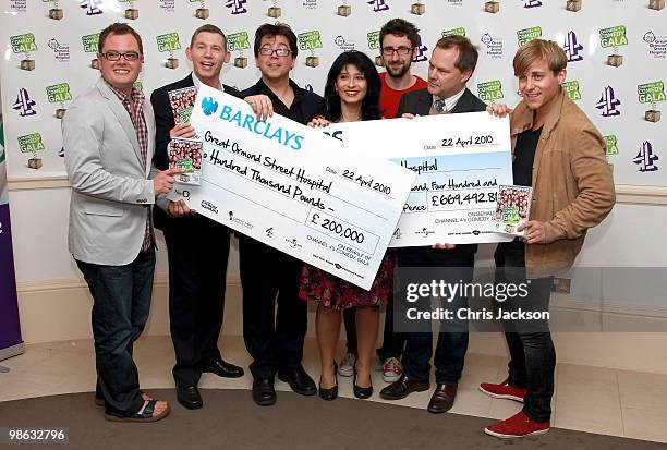 Comedians Alan Carr, Lee Evans, Michael Mcintyre, Shappi Khorsandi, Mark Watson, Jack Dee and Kevin Bishop pose at a photocall for the Great Ormond...