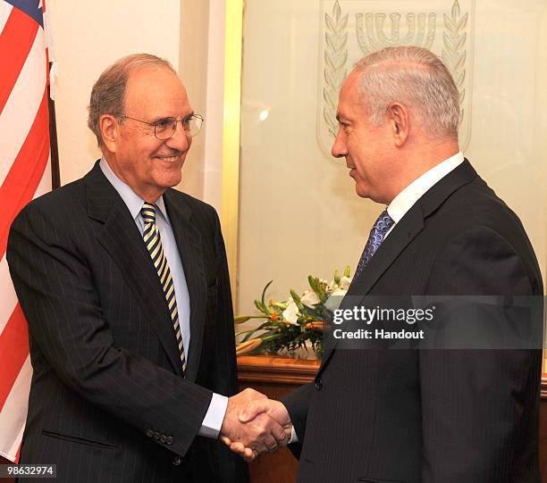 In this handout photo provided by the Israeli Government Press Office, US Special Middle East envoy George Mitchell meets with Israeli Prime Minister...