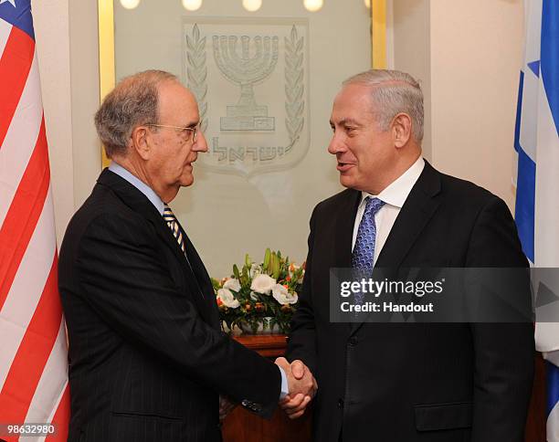 In this handout photo provided by the Israeli Government Press Office, US Special Middle East envoy George Mitchell meets with Israeli Prime Minister...