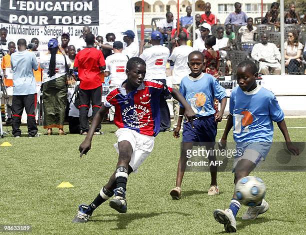 School children play soccer during a tournament, on April 23, 2010 in Saly, as part of a global education campaign linked to this year's World Cup in...
