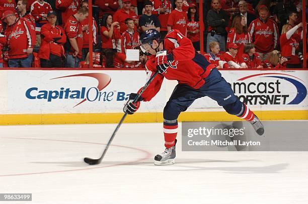 Eric Fehr of the Washington Capitals takes a shot during warm ups before the game against the Montreal Canadiens during Game One of the Eastern...