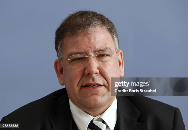 Christoph Ahlhaus, Interior Minister of the german state of Hamburg and head of the interior minister conference attend the press conference after...