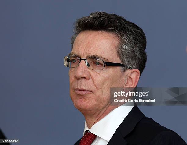 Thomas de Maiziere, German Interior Minister attend the press conference after the round table discussion on the subject of 'Gewalt im Zusammenhang...