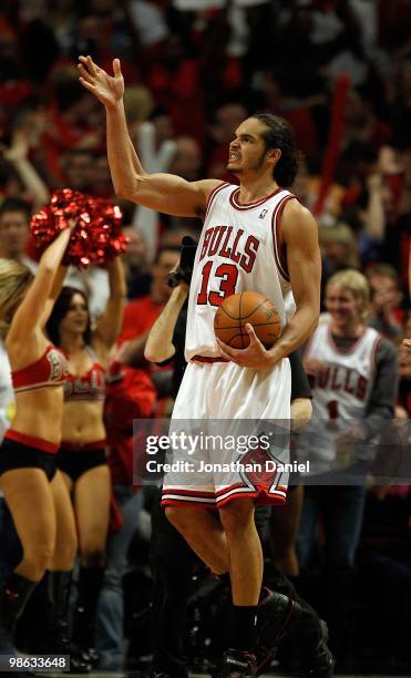 Joakim Noah of the Chicago Bulls celebrates a win over the Cleveland Cavaliers in Game Three of the Eastern Conference Quarterfinals during the 2010...