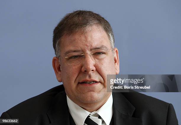 Christoph Ahlhaus, Interior Minister of the german state of Hamburg and head of the interior minister conference attend the press conference after...