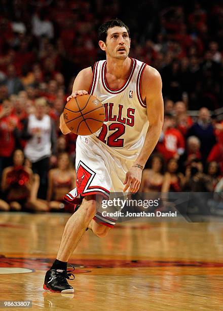 Kirk Hinrich of the Chicago Bulls moves up the court against the Cleveland Cavaliers in Game Three of the Eastern Conference Quarterfinals during the...