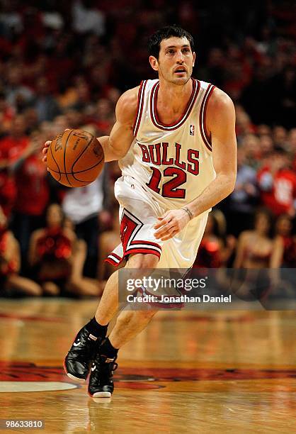 Kirk Hinrich of the Chicago Bulls moves up the court against the Cleveland Cavaliers in Game Three of the Eastern Conference Quarterfinals during the...